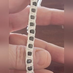 Braided white ankle bracelet. Very pretty to wear.
